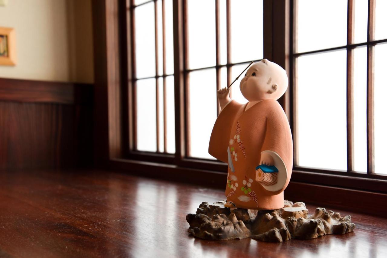 Kadokyu Ryokan Takaoka Bagian luar foto