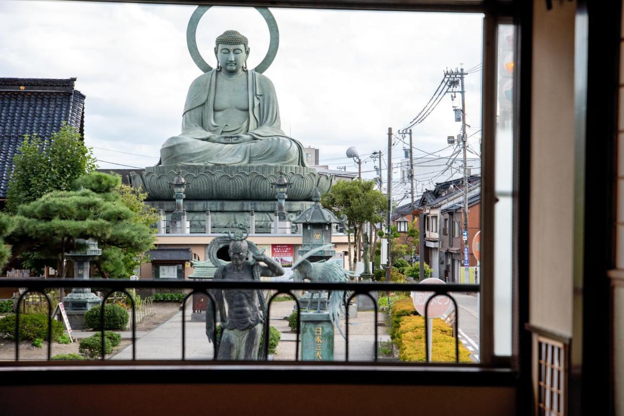 Kadokyu Ryokan Takaoka Bagian luar foto