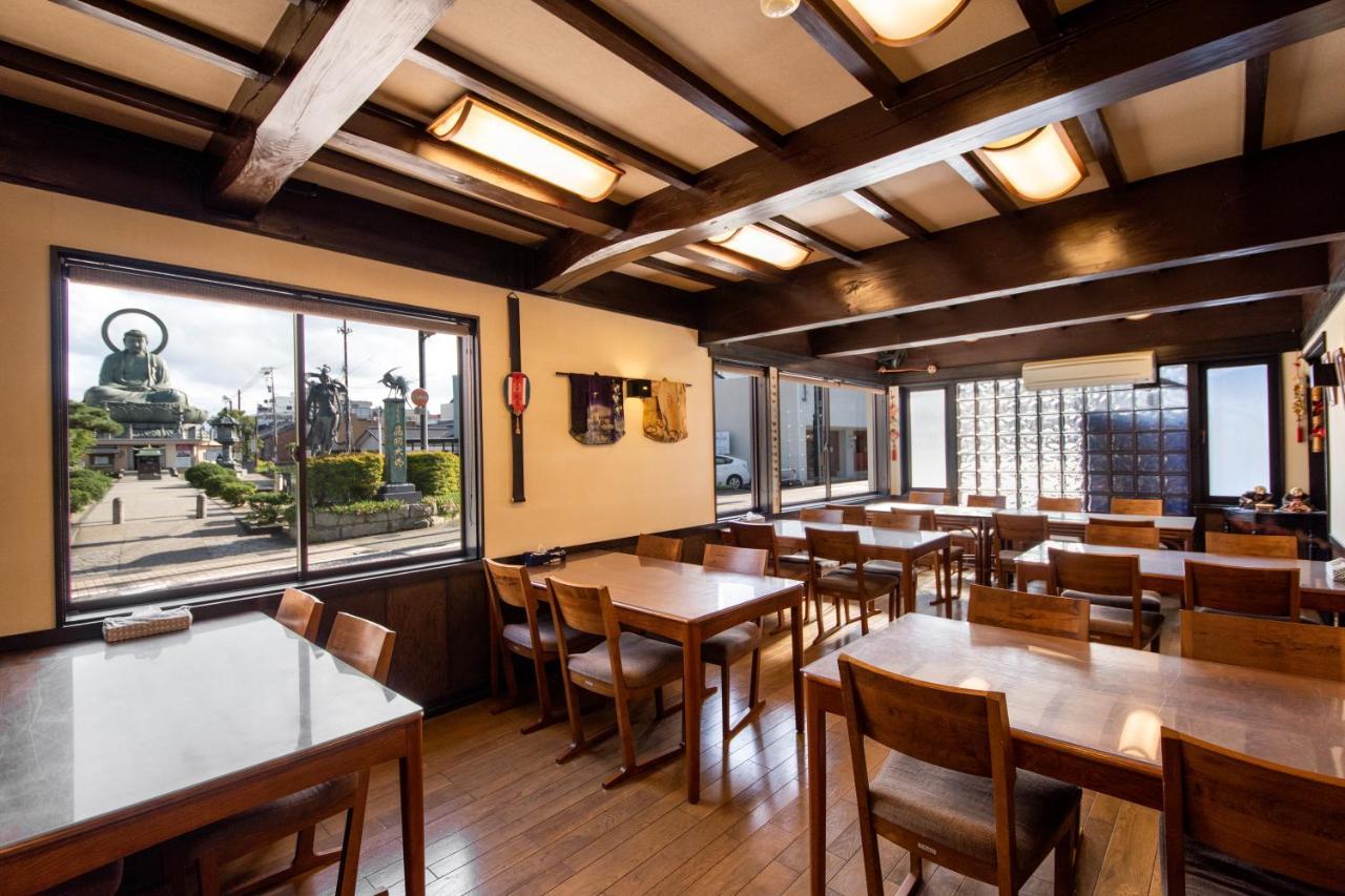Kadokyu Ryokan Takaoka Bagian luar foto
