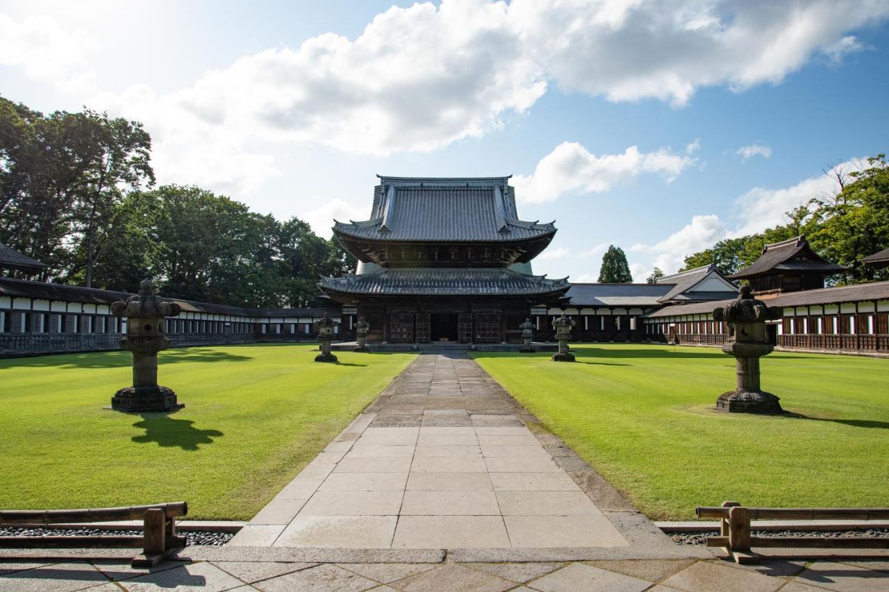 Kadokyu Ryokan Takaoka Bagian luar foto