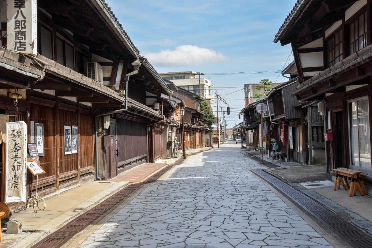 Kadokyu Ryokan Takaoka Bagian luar foto