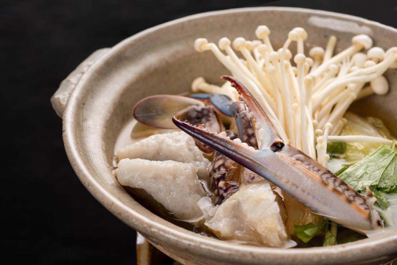 Kadokyu Ryokan Takaoka Bagian luar foto