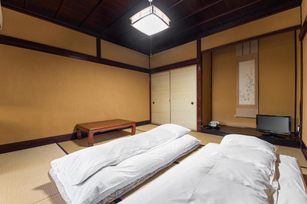 Kadokyu Ryokan Takaoka Bagian luar foto