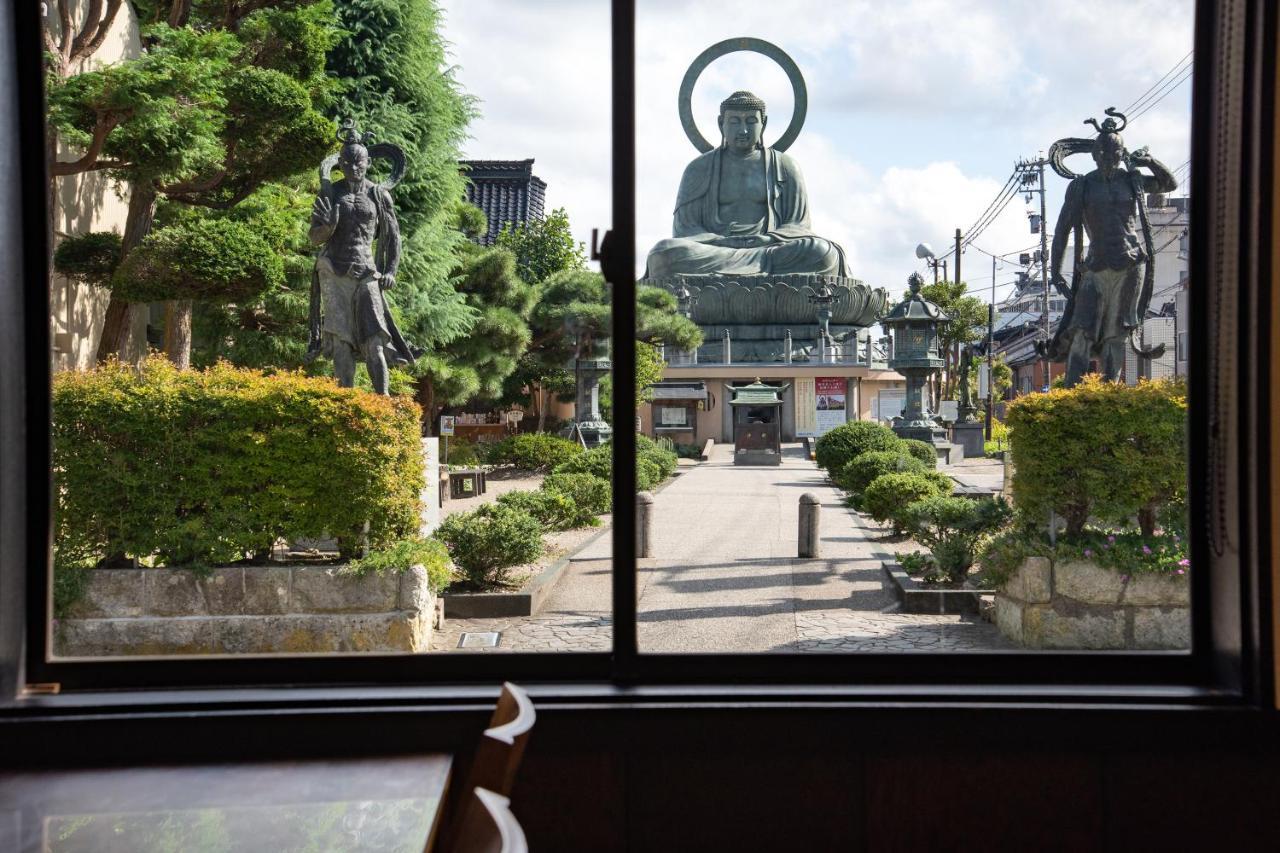 Kadokyu Ryokan Takaoka Bagian luar foto