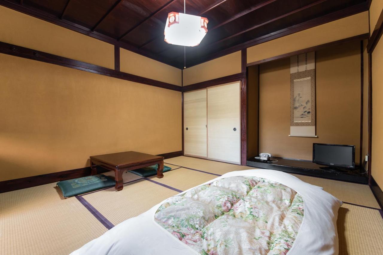 Kadokyu Ryokan Takaoka Bagian luar foto
